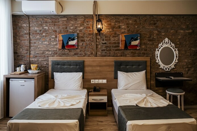 Imagen de la habitación del HASUNİ TAŞ HOTEL. Foto 17