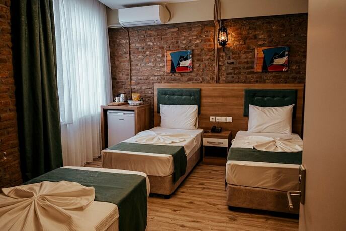 Imagen de la habitación del HASUNİ TAŞ HOTEL. Foto 18