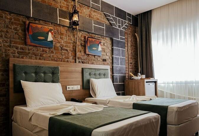 Imagen de la habitación del HASUNİ TAŞ HOTEL. Foto 19