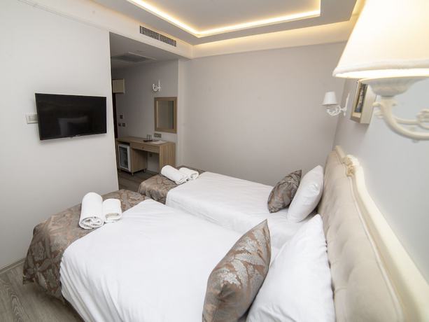 Imagen de la habitación del HHK Downtown. Foto 3