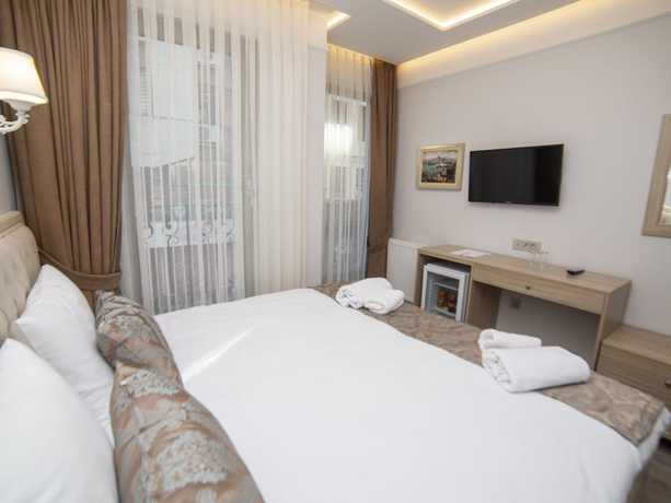 Imagen de la habitación del HHK Downtown. Foto 6