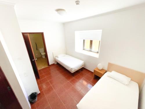Imagen de la habitación del HI Areia Branca - Pousada de Juventude. Foto 14