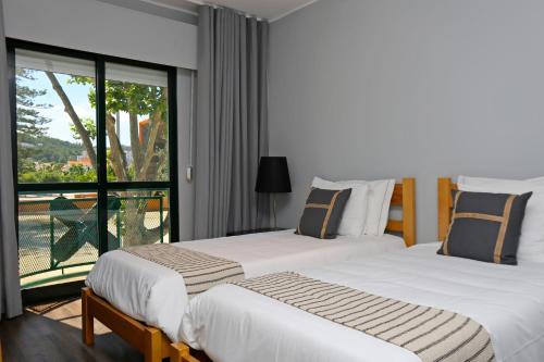 Imagen de la habitación del HI Setubal - Pousada de Juventude - CASA DO LARGO. Foto 17