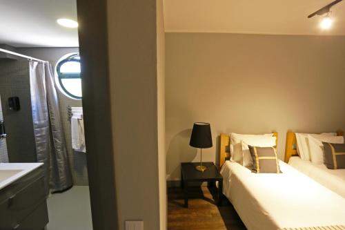 Imagen de la habitación del HI Setubal - Pousada de Juventude - CASA DO LARGO. Foto 18