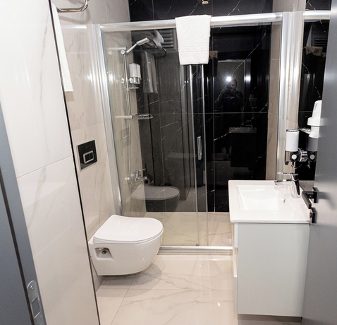 Imagen de la habitación del HOLMİ OTEL. Foto 4