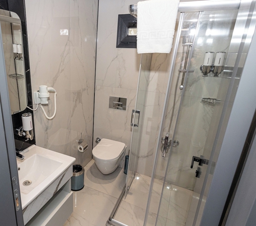 Imagen de la habitación del HOLMİ OTEL. Foto 6