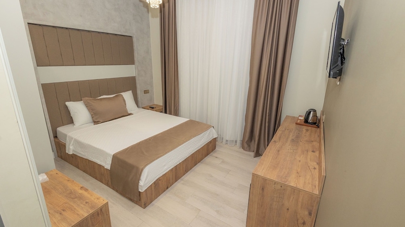 Imagen de la habitación del HOLMİ OTEL. Foto 8
