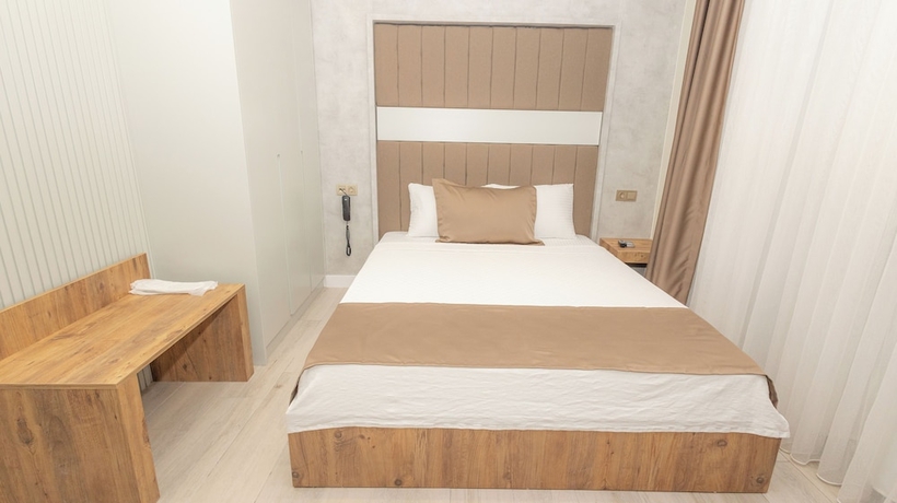 Imagen de la habitación del HOLMİ OTEL. Foto 9