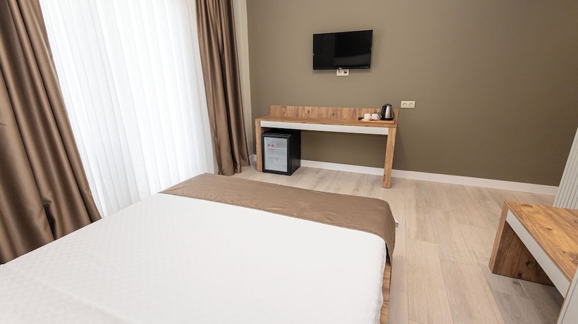 Imagen de la habitación del HOLMİ OTEL. Foto 12