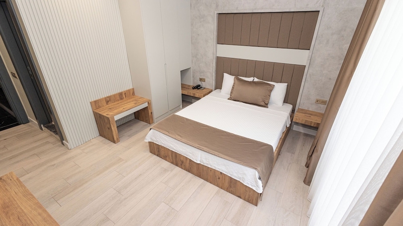 Imagen de la habitación del HOLMİ OTEL. Foto 13