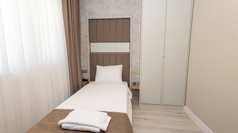 Imagen de la habitación del HOLMİ OTEL. Foto 14