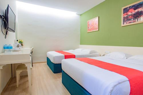 Imagen de la habitación del HOTEL 101 PERMAS JAYA. Foto 17