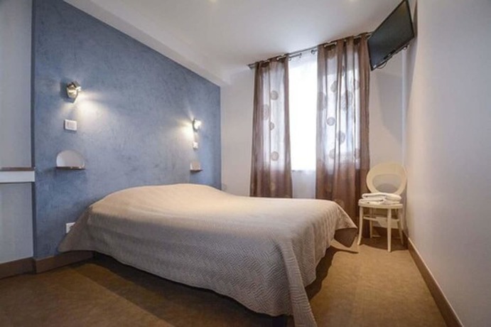 Imagen de la habitación del HOTEL DE LA POMME D\'OR. Foto 11