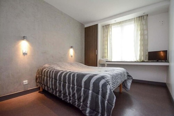 Imagen de la habitación del HOTEL DE LA POMME D\'OR. Foto 16
