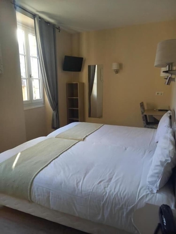 Imagen de la habitación del HOTEL DES BAINS, FIGEAC. Foto 3