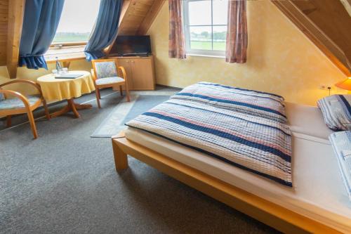 Imagen de la habitación del HOTEL DÜNENLÄUFER Carolinensiel. Foto 10