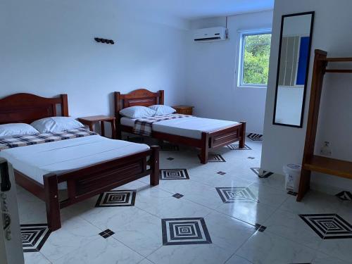 Imagen de la habitación del HOTEL EL VAQUIANO. Foto 18