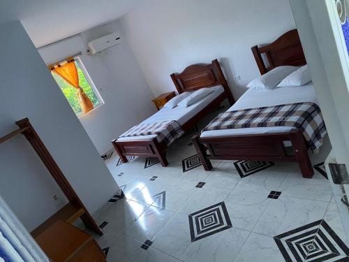 Imagen de la habitación del HOTEL EL VAQUIANO. Foto 19