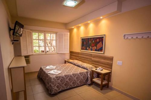 Imagen de la habitación del HOTEL FAZENDA ROCHEDO. Foto 17