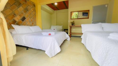 Imagen de la habitación del HOTEL LA GAITANA HEROINA INDIGENA. Foto 17