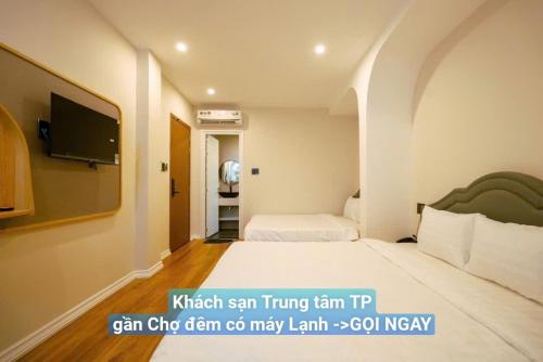 Imagen general del HOTEL NMC - Kh&aacute;ch Sạn gần Chợ Đ&ecirc;m c&oacute; m&aacute;y Lạnh. Foto 8