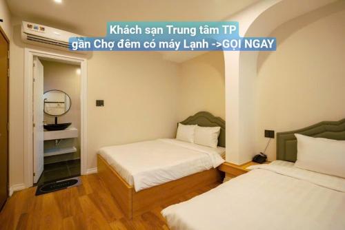 Imagen general del HOTEL NMC - Kh&aacute;ch Sạn gần Chợ Đ&ecirc;m c&oacute; m&aacute;y Lạnh. Foto 9