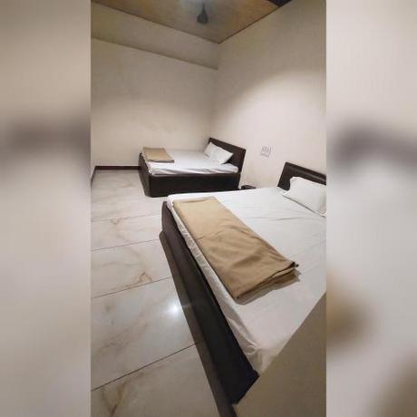 Imagen de la habitación del HOTEL OM PALACE. Foto 17