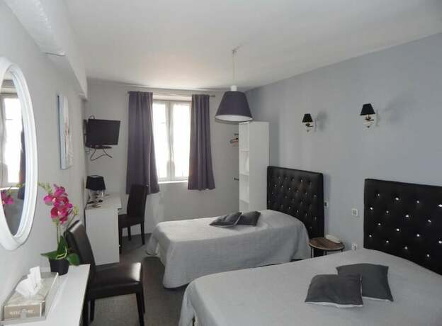 Imagen de la habitación del HOTEL RESTAURANT LE CYGNE. Foto 20