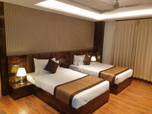 Imagen de la habitación del HOTEL SUNCITY PALACE. Foto 20