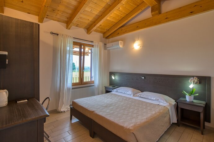 Imagen de la habitación del HOTEL VILLA CAMPO ROSSO. Foto 19