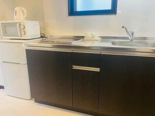 Imagen de la habitación del HOTEL Y\'RISE TO URASOE. Foto 17