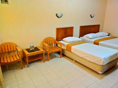 Imagen de la habitación del HOTEL & WISMA BINTANG JADAYAT. Foto 3