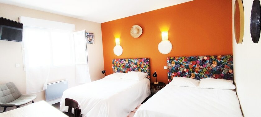 Imagen de la habitación del HOTELandCANTINE DE LA PLAGE. Foto 12