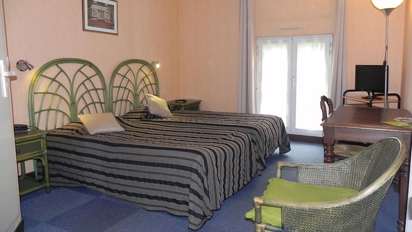 Imagen de la habitación del H&Ocirc;TEL DU SAUMON. Foto 7