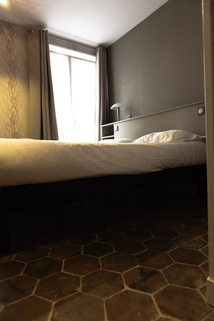 Imagen de la habitación del H&Ocirc;TEL DU SAUMON. Foto 11