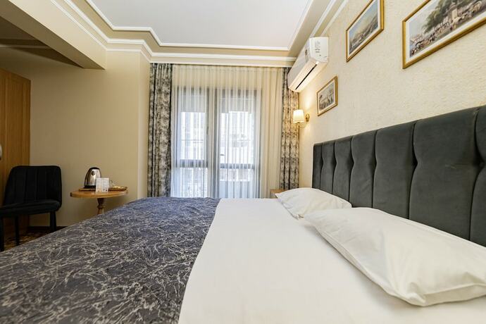 Imagen de la habitación del Hamit Hotel Kizilay. Foto 11