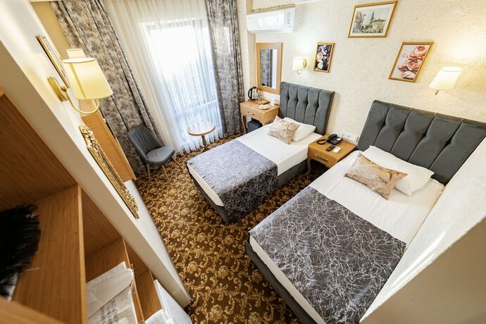 Imagen de la habitación del Hamit Hotel Kizilay. Foto 18
