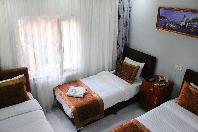 Imagen de la habitación del Hamzabey Hotel. Foto 12