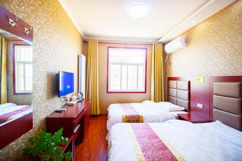 Imagen de la habitación del Hangtian Inn. Foto 8