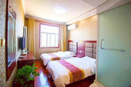 Imagen de la habitación del Hangtian Inn. Foto 9