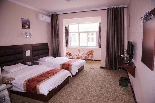Imagen general del Hangyu Business Inn. Foto 4