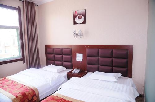 Imagen general del Hangyu Business Inn. Foto 7