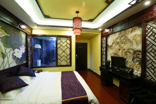 Imagen de la habitación del Hanmoyaxuanjiangjing Inn. Foto 6