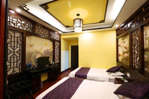 Imagen de la habitación del Hanmoyaxuanjiangjing Inn. Foto 8