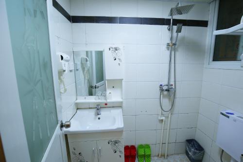 Imagen de la habitación del Hanmoyaxuanjiangjing Inn. Foto 9