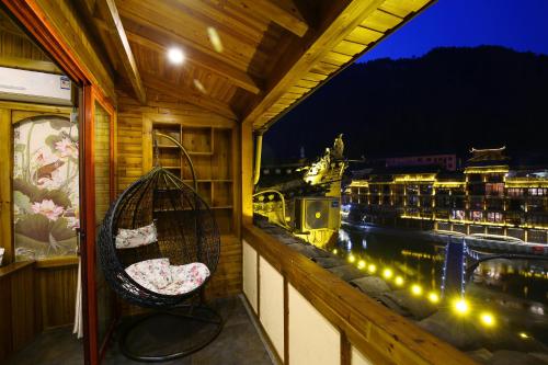 Imagen de la habitación del Hanmoyaxuanjiangjing Inn. Foto 10