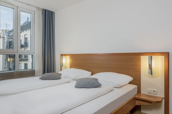 Imagen de la habitación del Hapimag Resort München. Foto 13