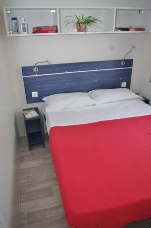 Imagen de la habitación del Happy Camp Rosapineta Camping Village. Foto 17