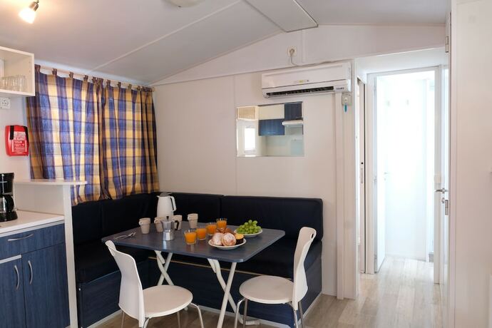 Imagen de la habitación del Happy Camp Rosapineta Camping Village. Foto 20