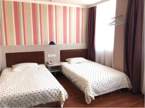 Imagen de la habitación del Happy Home Inn Binzhou Bohai Balu Branch. Foto 7